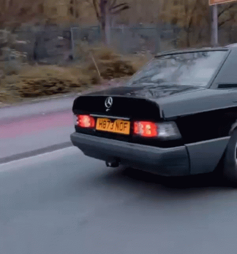 A Black Mercedes With A License Plate That Says Hb73 Nof GIF
