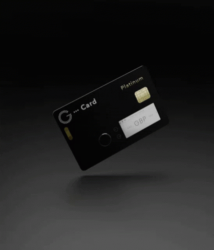 A Black Platinum Credit Card With A Gold Chip GIF