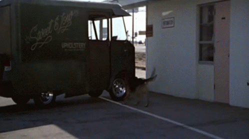 A Black Van That Says Sweet Joy Upholstery On It GIF
