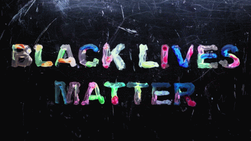 A Blackboard With The Words " Black Lives Matter " Painted In Different Colors GIF
