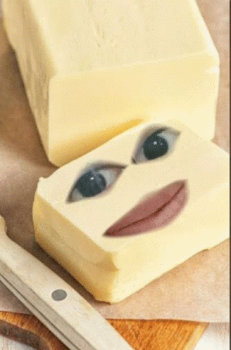 A Block Of Butter With A Face On It GIF