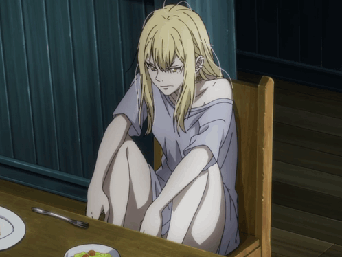 A Blonde Anime Character Sits At A Table With A Plate Of Food On It GIF