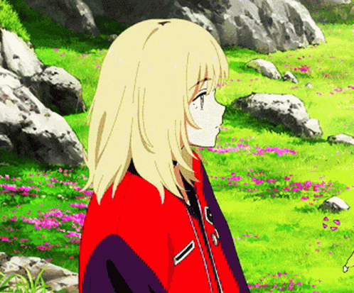 A Blonde Anime Girl In A Red Jacket Stands In A Field Of Flowers And Rocks GIF