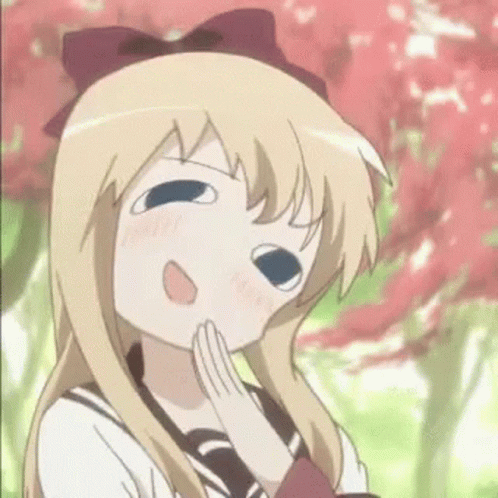 A Blonde Anime Girl Is Making A Funny Face With Her Hands On Her Chin . GIF