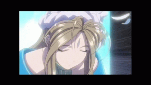 A Blonde Anime Girl With Her Eyes Closed And A White Hat On Her Head GIF