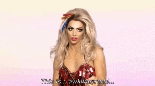 A Blonde Woman In A Red Dress Says This Is Awkwardddd GIF