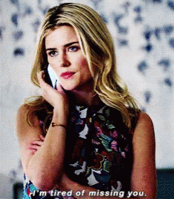 A Blonde Woman Is Talking On A Cell Phone And Says I 'M Tired Of Missing You GIF