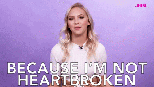 A Blonde Woman Says " Because I 'M Not Heartbroken " GIF