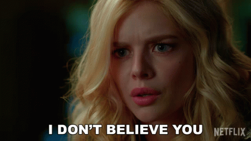 A Blonde Woman Says " I Don 'T Believe You " In Front Of A Netflix Logo GIF