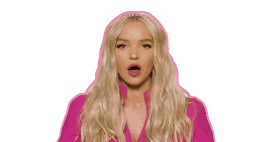 a blonde woman wearing a pink shirt and a tiara