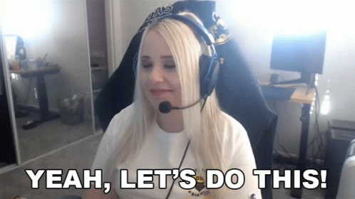 A Blonde Woman Wearing Headphones And A Microphone Says Yeah Let 'S Do This GIF