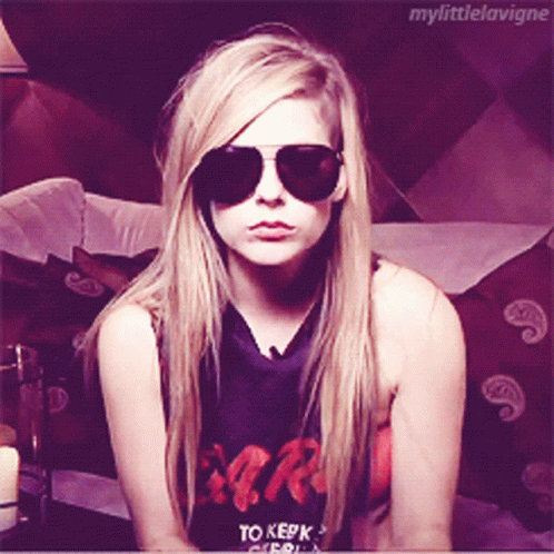 A Blonde Woman Wearing Sunglasses And A Shirt That Says To Keep GIF