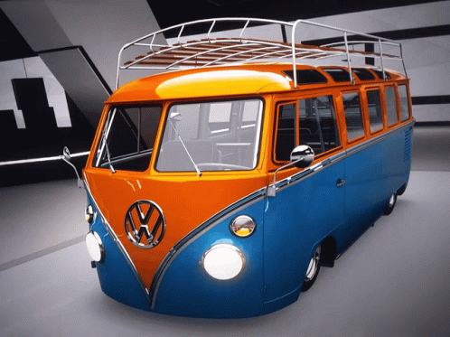 A Blue And Orange Vw Van With A Roof Rack On Top GIF
