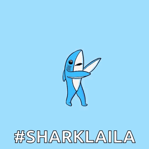 A Blue And White Cartoon Shark With The Words #Sharklaila Below It GIF