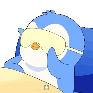 A Blue And White Penguin Wearing A Sleep Mask With The Letter H On The Bottom GIF