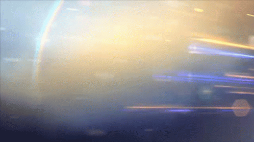 a blue and yellow background with a rainbow in the background