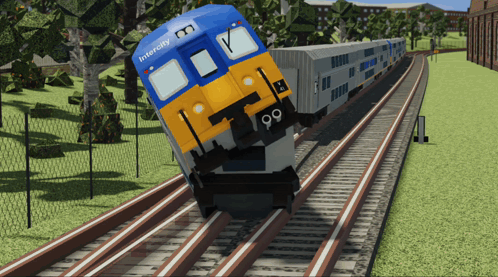 A Blue And Yellow Train With The Number 99 On The Front GIF