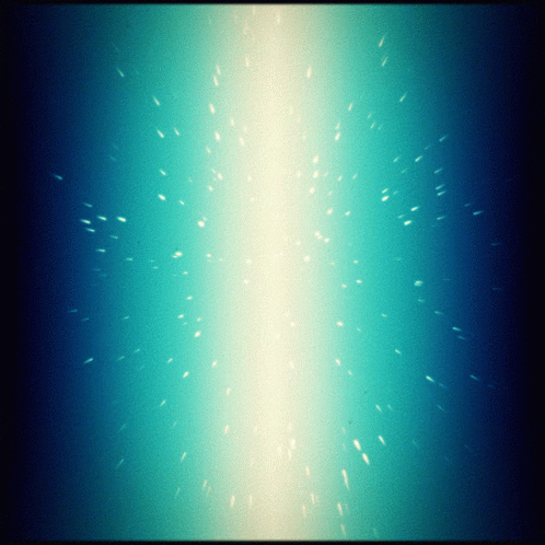 A Blue Background With A Light Coming From The Right GIF