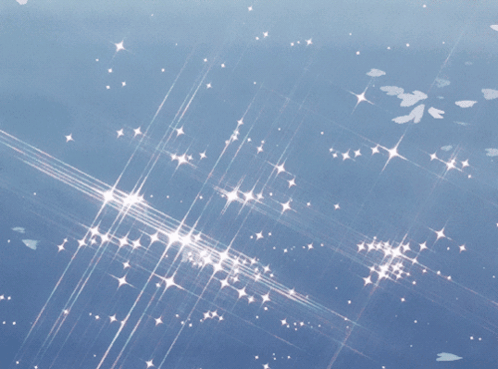 A Blue Background With A Lot Of Stars Shining On It GIF