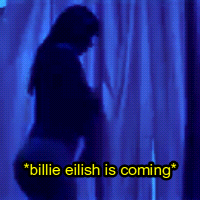 A Blue Background With The Words Billie Eilish Is Coming Written On It GIF