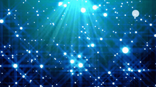 A Blue Background With White Dots And Rays GIF