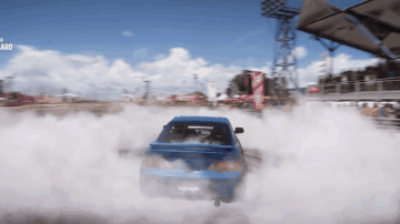A Blue Car Is Drifting On A Race Track And The Word Drift Is On The Bottom Right GIF