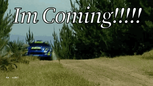 A Blue Car Is Driving Down A Dirt Road With The Words Im Coming Written On The Bottom GIF