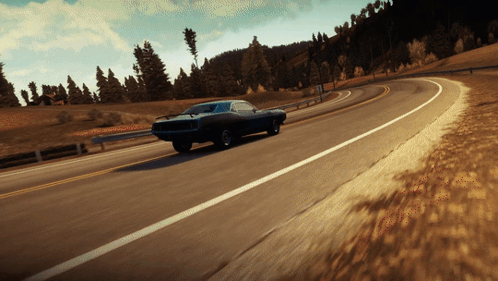 A Blue Car Is Driving Down A Road With Trees In The Background GIF