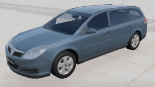 A Blue Car With Silver Wheels Is Parked On The Side Of The Road GIF