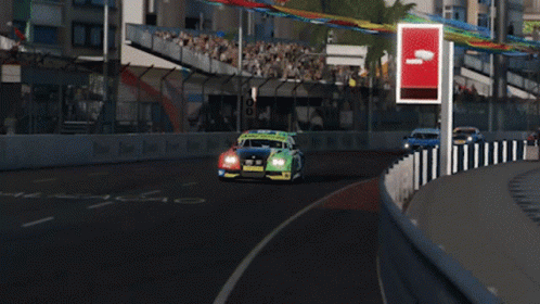 A Blue Car With The Number 3 On The Side GIF