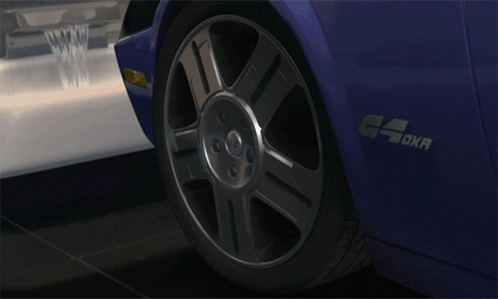 A Blue Car With The Word G4oxr On The Side Of It GIF