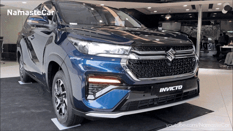 A Blue Car With The Word Invicto On The Front Of It GIF