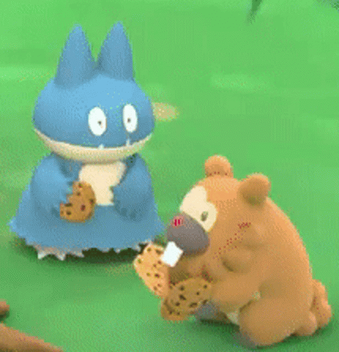 A Blue Cat And A Brown Bear Are Holding Cookies GIF