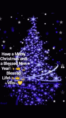 A Blue Christmas Tree With A Message That Says Have A Merry Christmas And A Blessed New Year . GIF