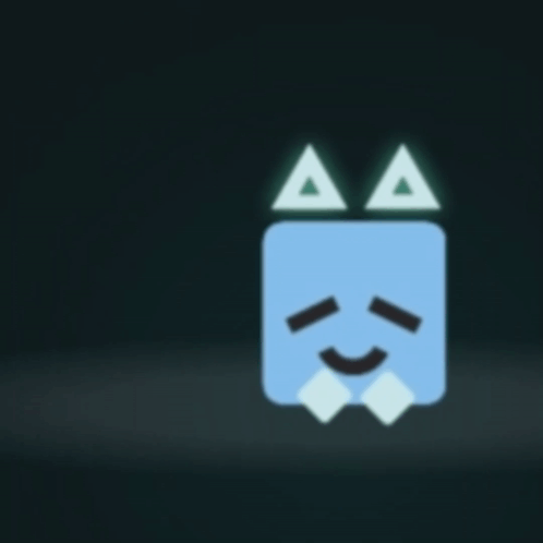 A Blue Cube With Cat Ears And A Smiling Face On It GIF