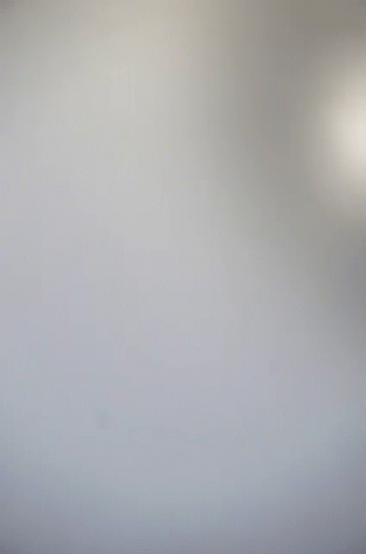 A Blue Cube With Pantone Color Of The Year 2020 Written On It GIF