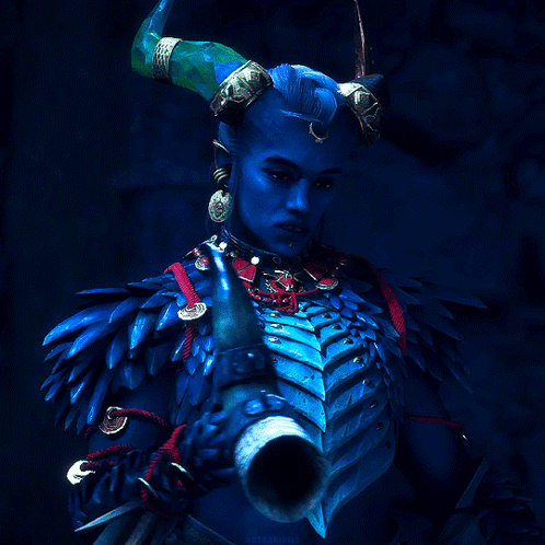 A Blue Demon With Horns And A Skull Bracelet GIF