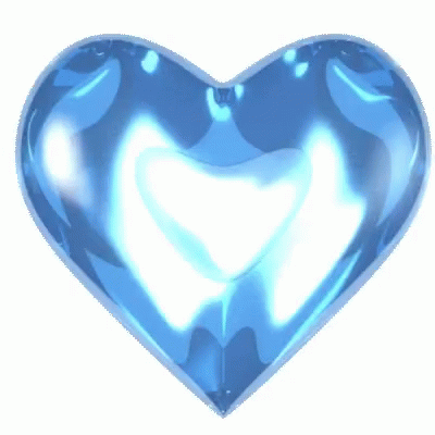 A Blue Heart On A White Background That Looks Like A Sapphire GIF