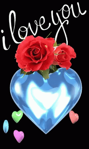 A Blue Heart With Red Roses In It And The Words " I Love You " GIF