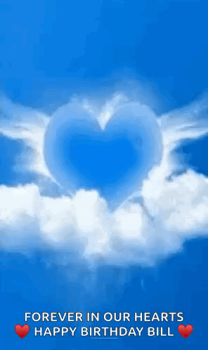 A Blue Heart With Wings Is Floating In The Clouds . GIF