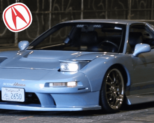 A Blue Honda With A California License Plate GIF