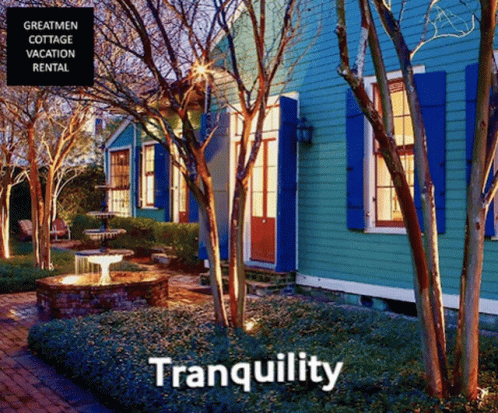 A Blue House With Blue Shutters Is Advertised As A Tranquility Vacation Rental GIF