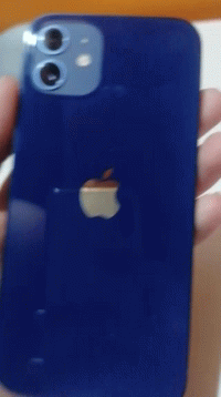 A Blue Iphone Is Being Held In A Person 'S Hand . GIF