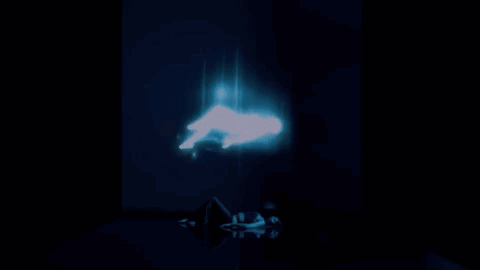 A Blue Light Is Coming Out Of A Dark Room GIF