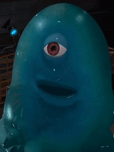 A Blue Monster With A Red Eye And A Mouth GIF