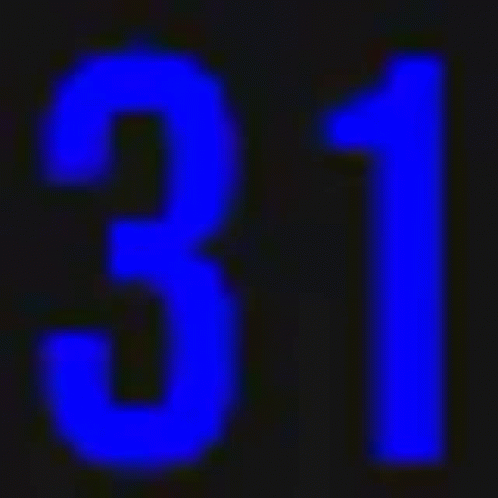 A Blue Number 31 Is Displayed On A Black Background . GIF