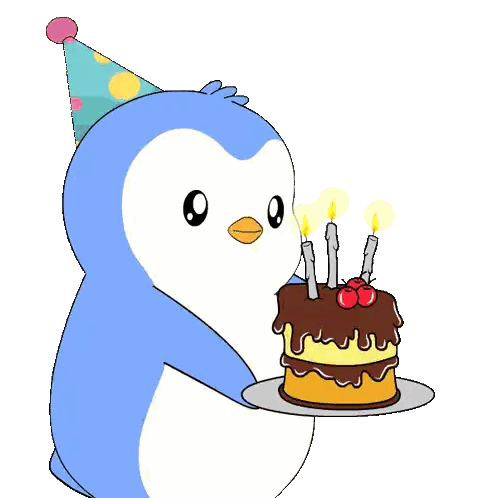a blue penguin wearing a party hat blows out candles on a birthday cake