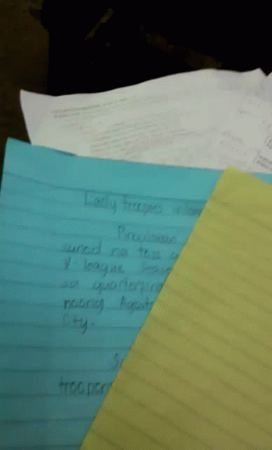 A Blue Piece Of Paper With Lady Trooper Written On It Sits On Top Of A Yellow Piece Of Paper GIF