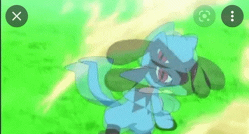 A Blue Pokemon With Red Eyes Is Standing In The Grass And Looking At The Camera . GIF