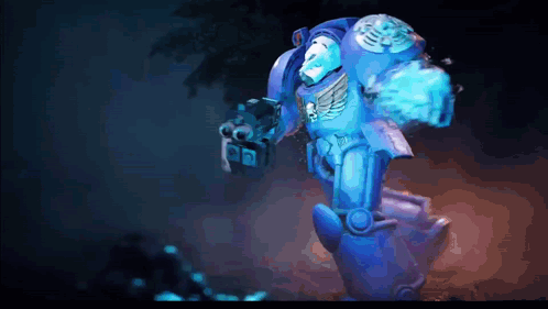 A Blue Robot With A Skull And Wings On It GIF